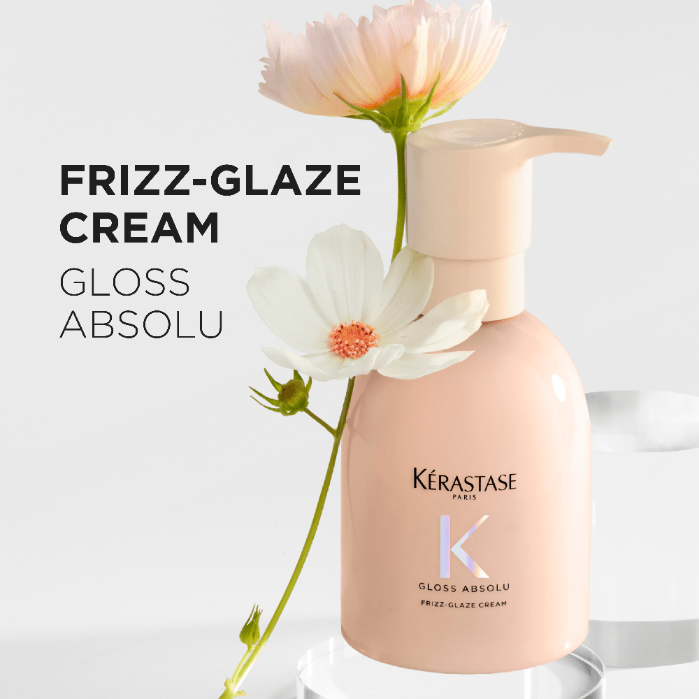 Applicazione Frizz-Glaze Cream Kérastase su capelli per effetto anticrespo


